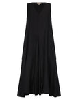 The Lenox Dress in black, styled to showcase its elegant V-neck and voluminous godet skirt.