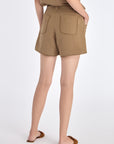 Lira Short in Taupe – Chic mid-rise linen shorts with elasticated waistband, metal-tipped belt, and patch pocket detailing.