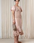 Liz Top in Blush – Handwoven crochet top with beaded embroidery and open-back design.