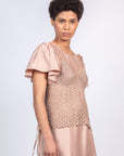 Liz Top in Blush – Handwoven crochet top with beaded embroidery and open-back design.