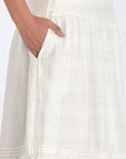 lose-up of the woven texture and tonal hem trim on the Off White Luanda Skirt.