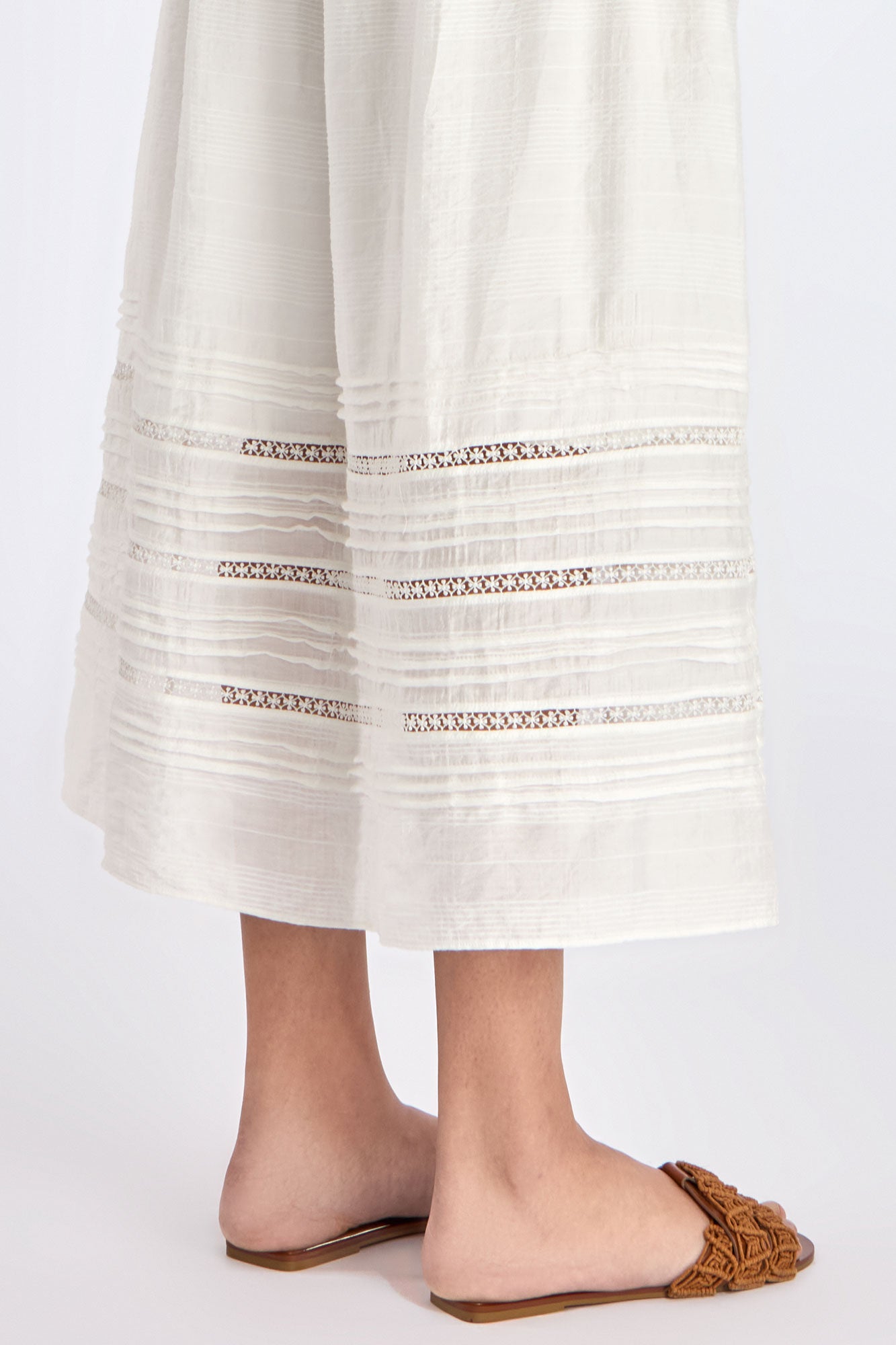 lose-up of the woven texture and tonal hem trim on the Off White Luanda Skirt.