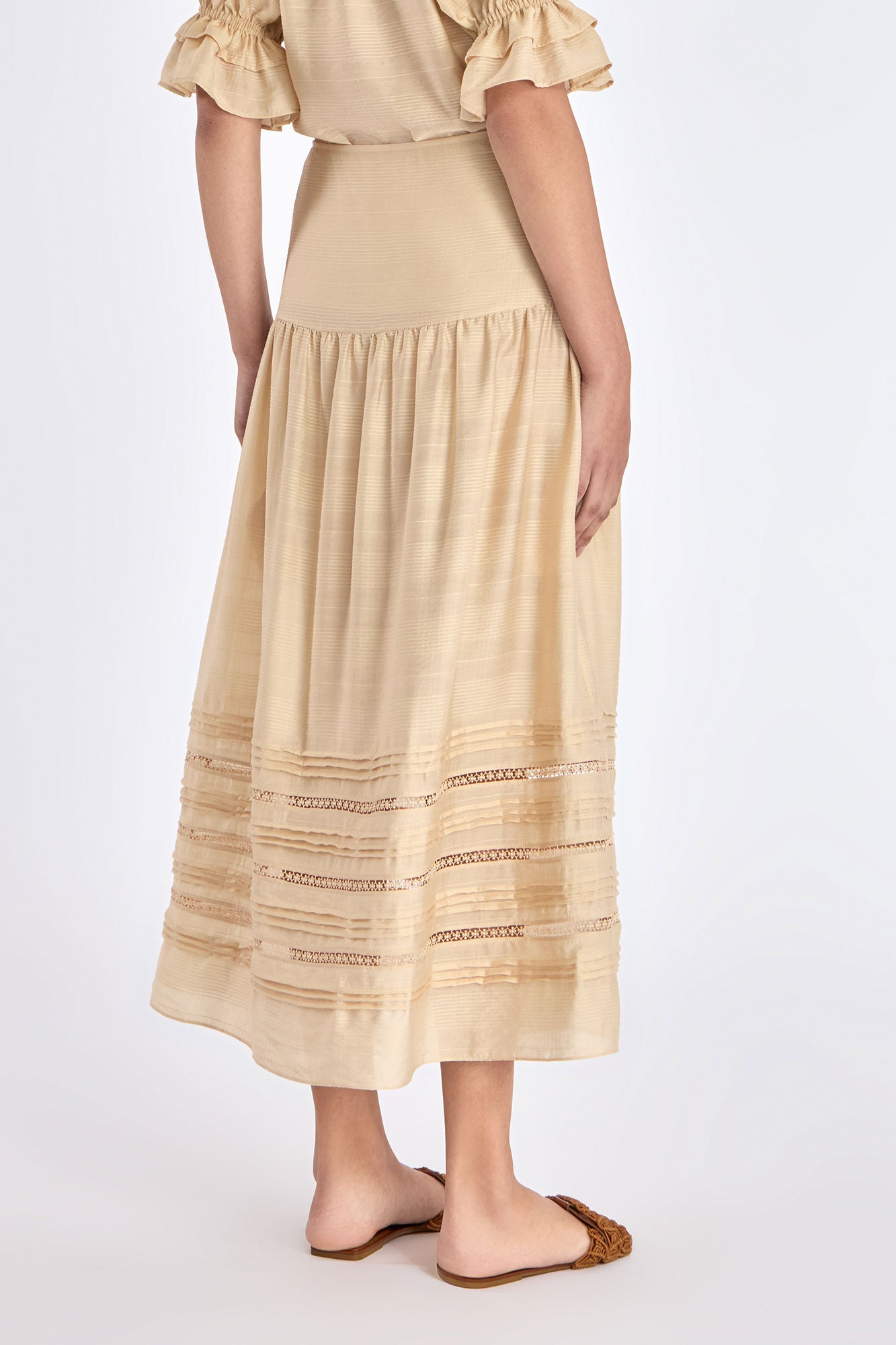 Back view of the Luanda Skirt, showing the clean fit of the high waistband.