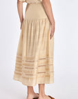 Back view of the Luanda Skirt, showing the clean fit of the high waistband.