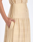 Close-up of the tonal trim and stitching detail on the hem of the Vanilla Luanda Skirt