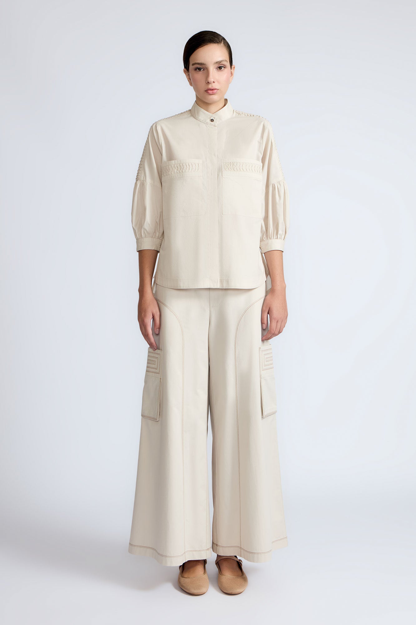 Magali Blouse in Prestine – Pima cotton blouse with Neru collar, hidden front buttons, patch pockets, and ¾ sleeves with semi-elastic cuffs.