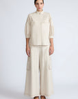Magali Blouse in Prestine – Pima cotton blouse with Neru collar, hidden front buttons, patch pockets, and ¾ sleeves with semi-elastic cuffs.