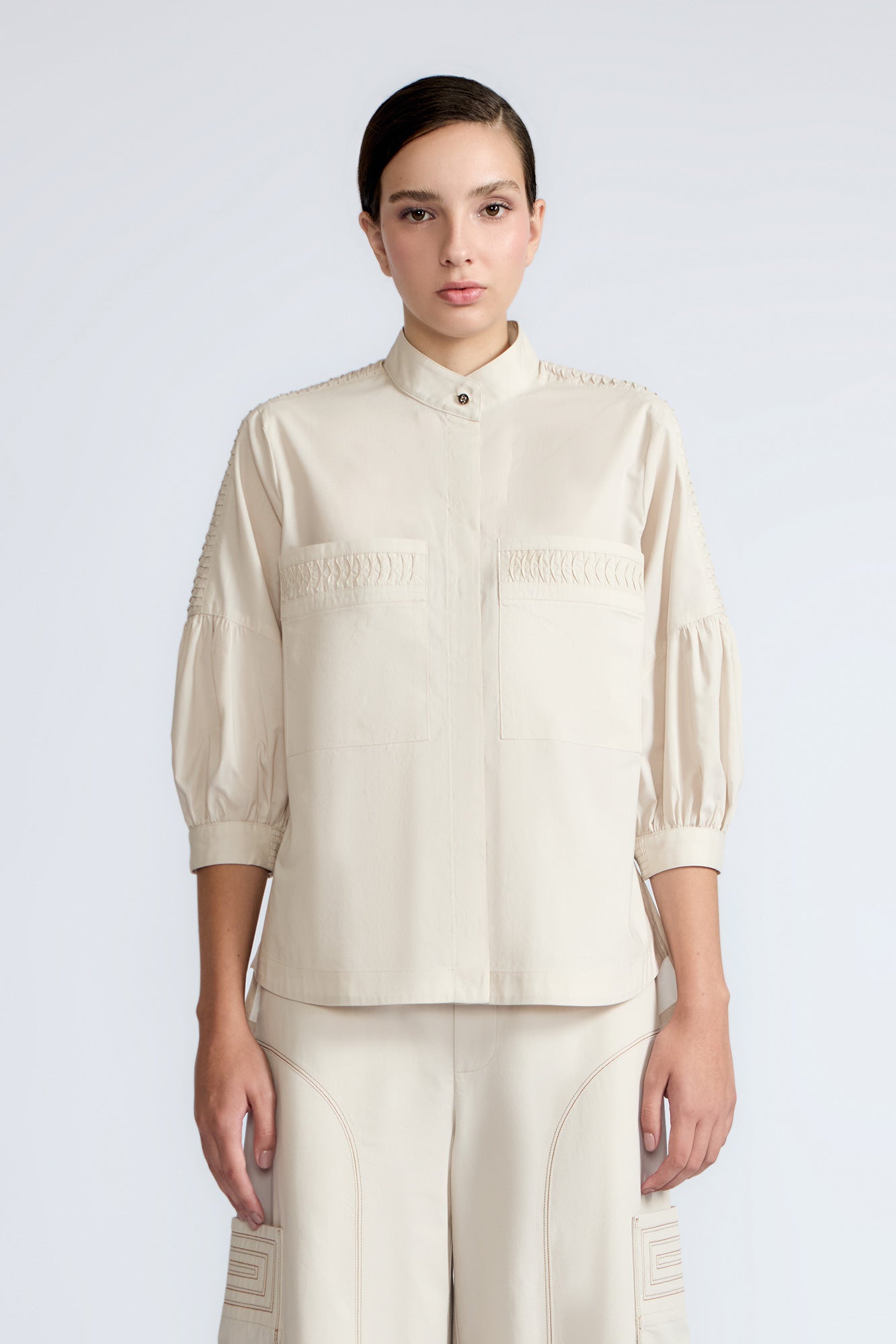 Magali Blouse in Prestine – Pima cotton blouse with Neru collar, hidden front buttons, patch pockets, and ¾ sleeves with semi-elastic cuffs.