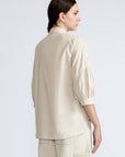 Magali Blouse in Prestine – Pima cotton blouse with Neru collar, hidden front buttons, patch pockets, and ¾ sleeves with semi-elastic cuffs.