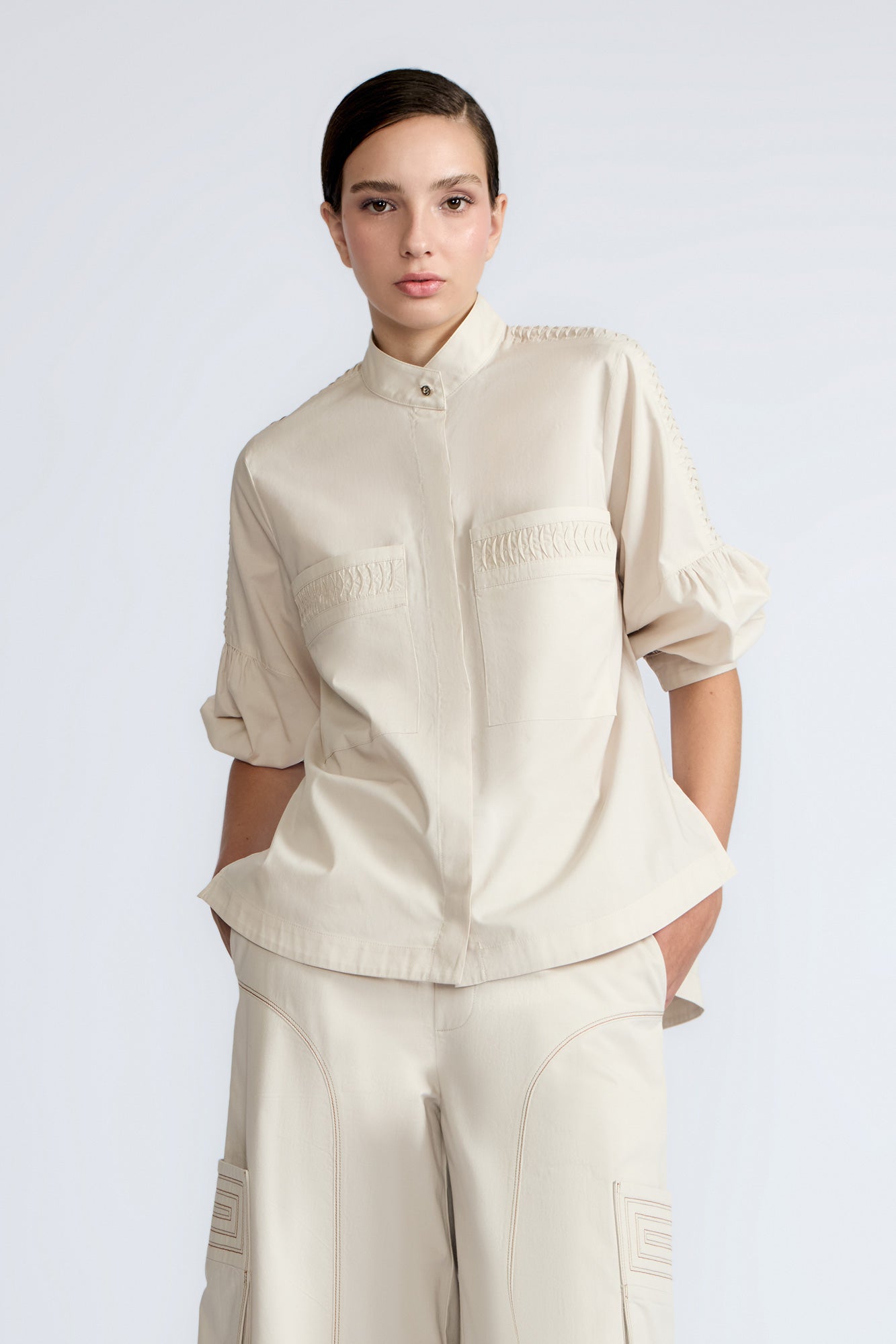 Magali Blouse in Prestine – Pima cotton blouse with Neru collar, hidden front buttons, patch pockets, and ¾ sleeves with semi-elastic cuffs.