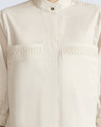 Magali Blouse in Prestine – Pima cotton blouse with Neru collar, hidden front buttons, patch pockets, and ¾ sleeves with semi-elastic cuffs.