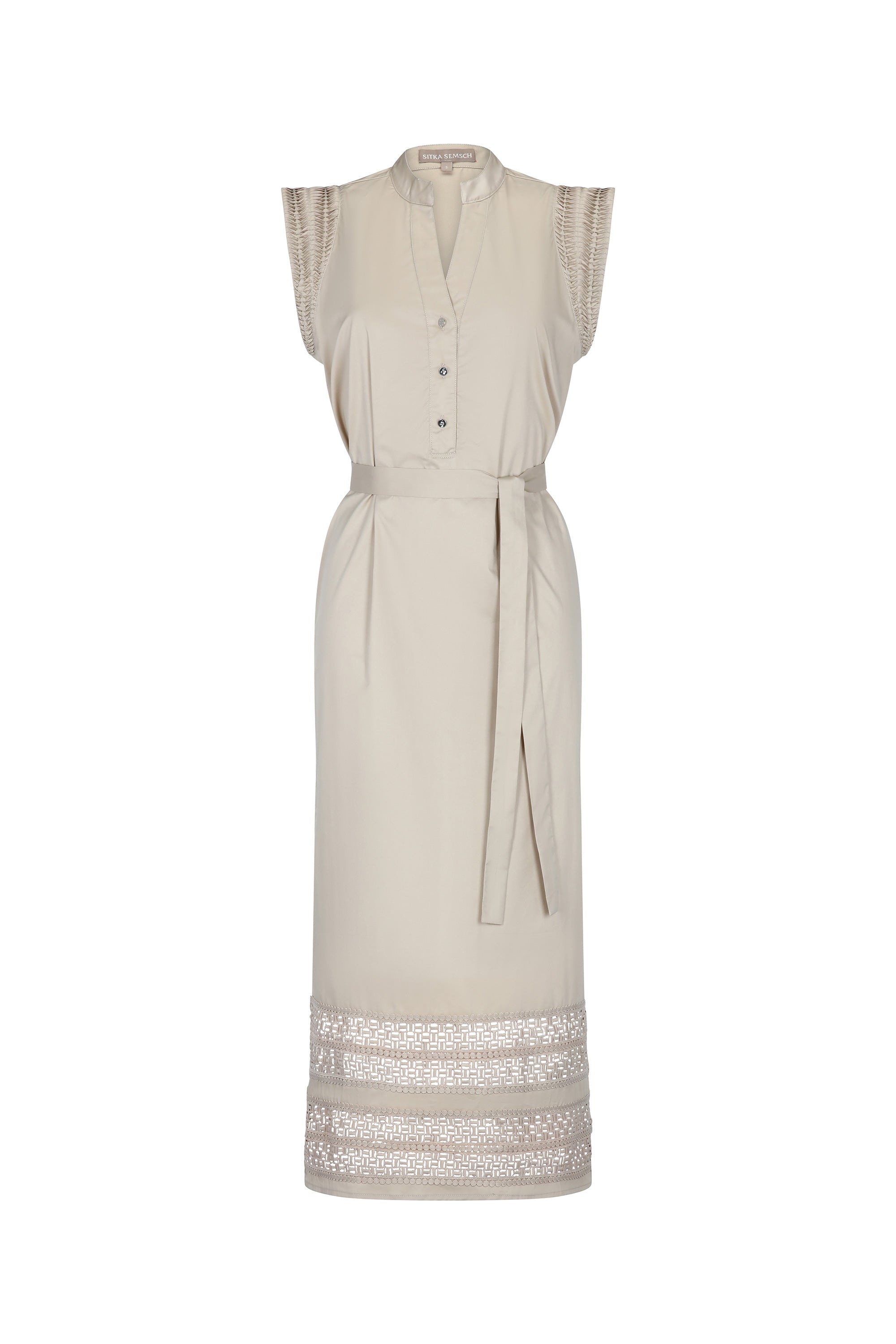 The Maki Dress in a natural Ecru, featuring its unique Nehru collar and self-fabric belt.