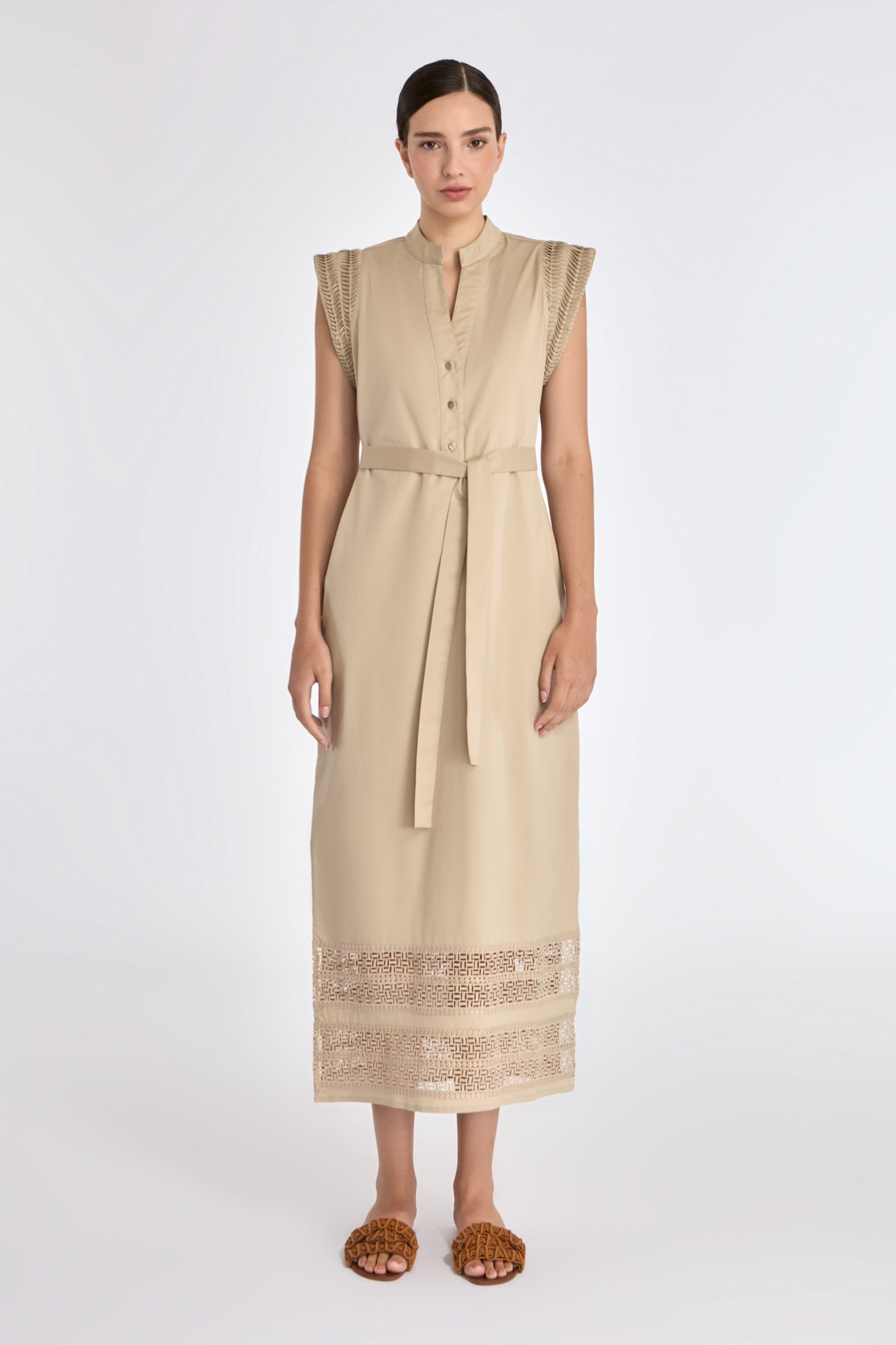 The Maki Dress in a natural Ecru, featuring its unique Nehru collar and self-fabric belt.