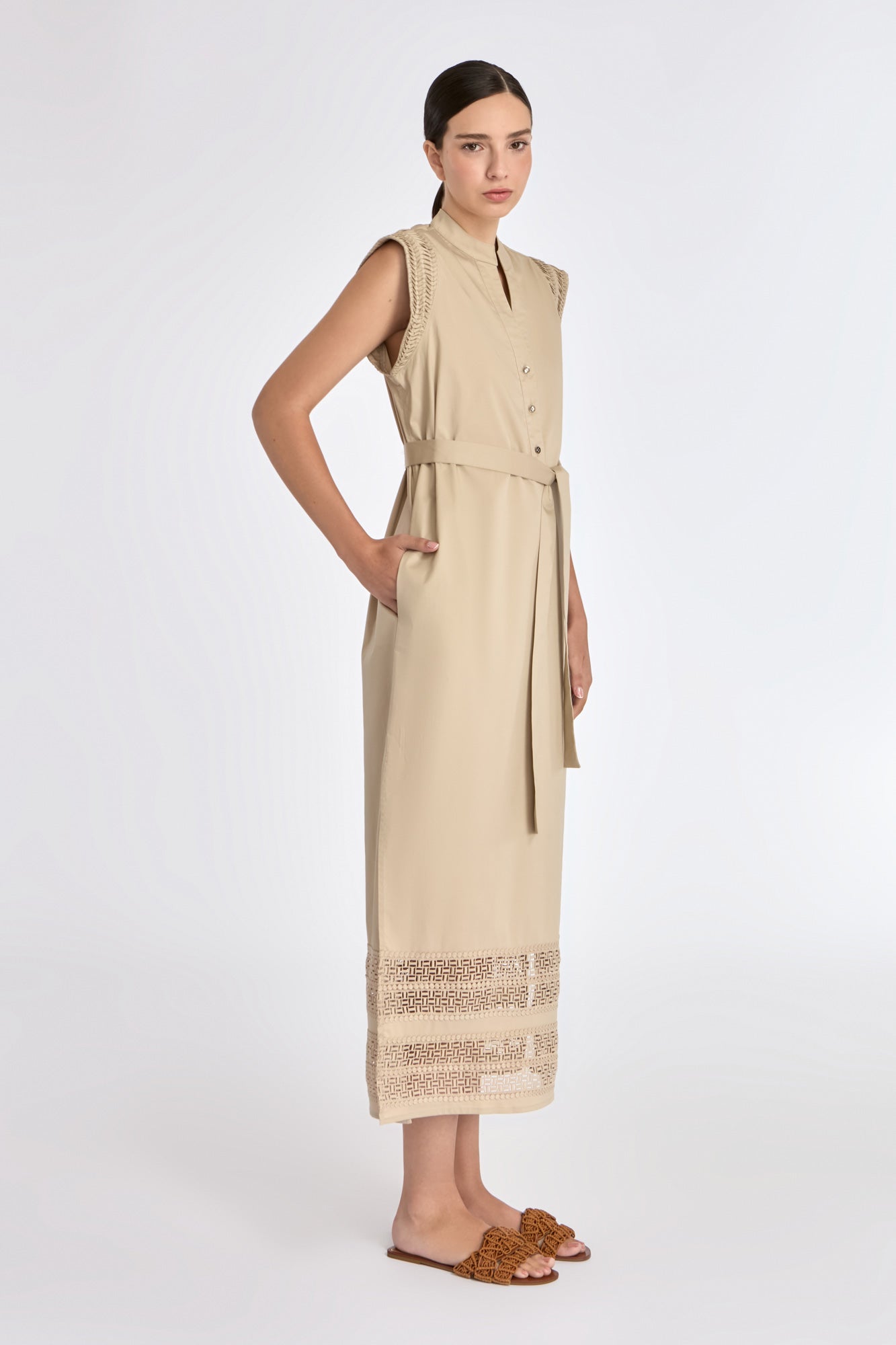 Side silhouette of the Ecru Maki Dress, showcasing its midi length and clean lines