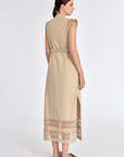 Elegant back view of the Maki Dress in Ecru.