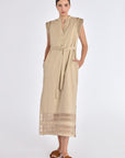 The Maki Dress in a natural Ecru, featuring its unique Nehru collar and self-fabric belt.