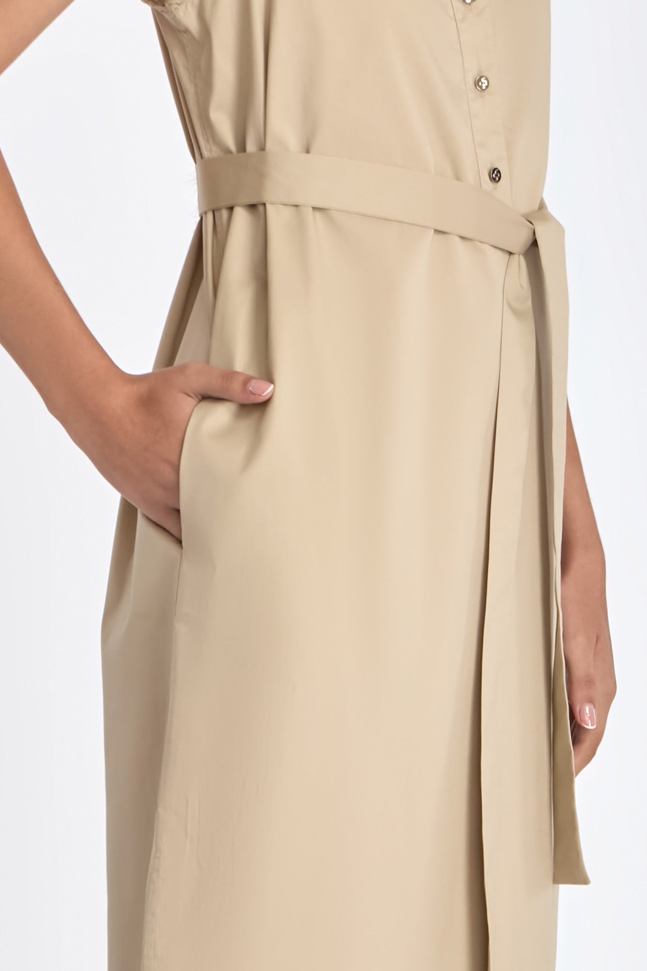 Side silhouette of the Ecru Maki Dress, showcasing its midi length and clean lines.