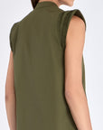 Back view of the Maki Dress, showing the elegant drape of the stretch cotton fabric.