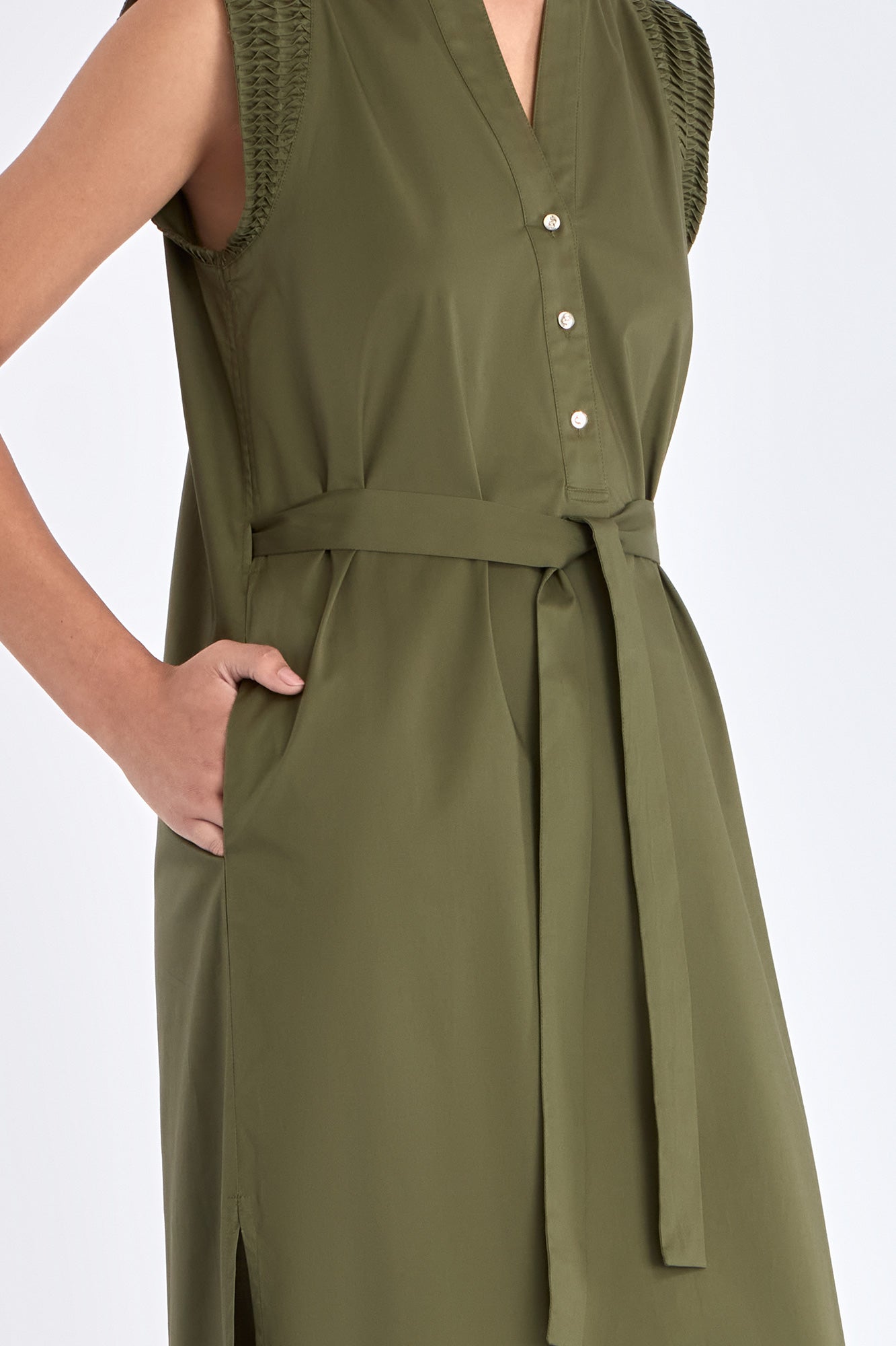 Close-up of the metal button and Nehru collar detail on the Olive Maki Dress.