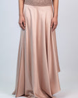 Mariani Skirt in Blush – Flowing asymmetrical silk maxi skirt with wide waistband.