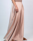 Mariani Skirt in Blush – Flowing asymmetrical silk maxi skirt with wide waistband.