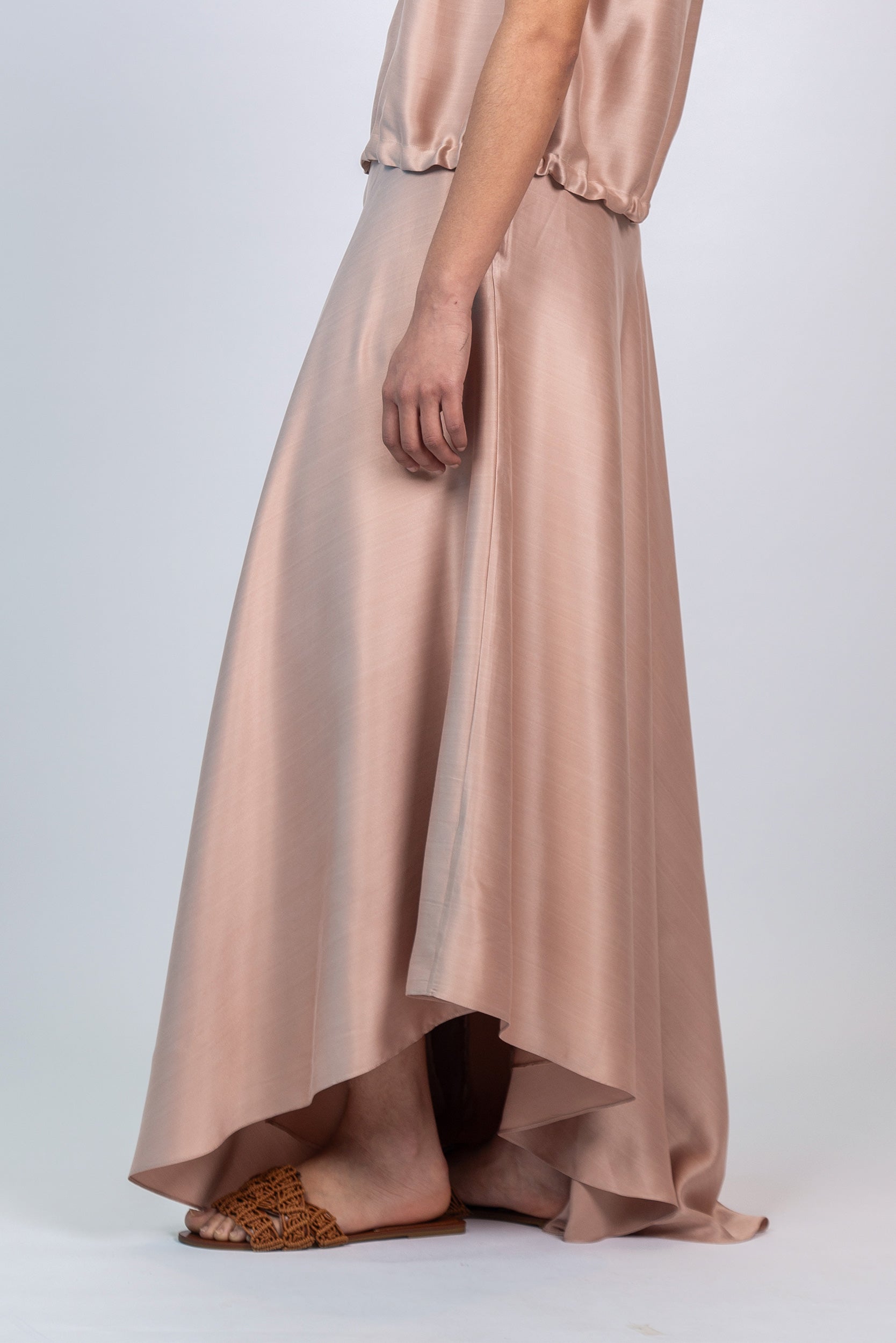 Mariani Skirt in Blush – Flowing asymmetrical silk maxi skirt with wide waistband.
