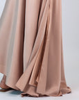 Mariani Skirt in Blush – Flowing asymmetrical silk maxi skirt with wide waistband.