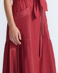 Detail of the adjustable waistband with metal toppers on the Milena Skirt.