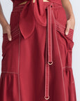 Detail of the adjustable waistband with metal toppers on the Milena Skirt.