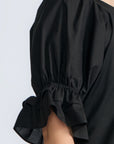 Nery Top in Black – Cotton knit top with short balloon sleeves, round neckline, and soft jersey-pima poplin mix.