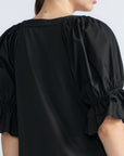 Nery Top in Black – Cotton knit top with short balloon sleeves, round neckline, and soft jersey-pima poplin mix.