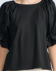 Nery Top in Black – Cotton knit top with short balloon sleeves, round neckline, and soft jersey-pima poplin mix.