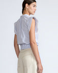 Oriana Blouse in Light Blue Stripes – Cotton blouse with V-neck, Neru collar, ruffled sleeves, appliqué trim, and tie-front hem.