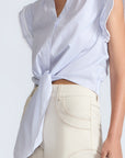 Oriana Blouse in Light Blue Stripes – Cotton blouse with V-neck, Neru collar, ruffled sleeves, appliqué trim, and tie-front hem.