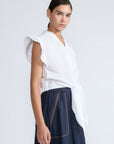 Oriana Blouse in White – Elegant cotton blouse with V-neck, Neru collar, ruffle sleeves, tie waist, and hand-appliqué detailing.