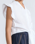Oriana Blouse in White – Elegant cotton blouse with V-neck, Neru collar, ruffle sleeves, tie waist, and hand-appliqué detailing.