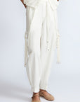 Paloma Pant in Off White – Relaxed cotton pants with patch pockets, contrast stitching, and side ties for a chic silhouette.