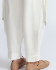 Paloma Pant in Off White – Relaxed cotton pants with patch pockets, contrast stitching, and side ties for a chic silhouette.