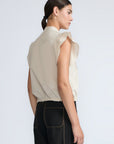 Pria Blouse in Prestine – Elegant sleeveless blouse in pima cotton with tonal V-neck, Greca trim, ruffle detail, and hem with pullers.