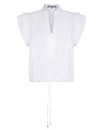Pria Blouse in White – Sleeveless pima cotton blouse with V-neckline, Greca trim, tonal stitching, ruffle sleeves, and hem pullers.