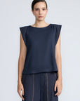 Regina Top in Navy – Soft knit top in 100% Pima cotton with round neck, Greca lace detail, dropped sleeves, and side slits.