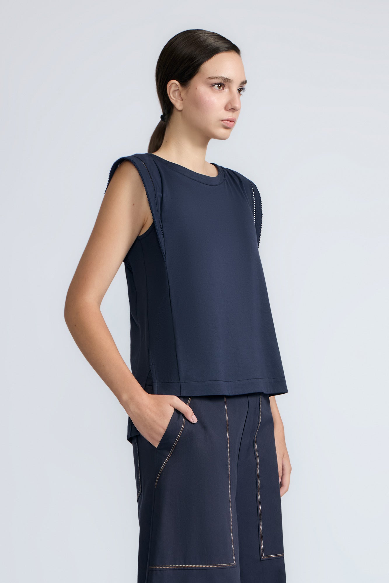 Regina Top in Navy – Soft knit top in 100% Pima cotton with round neck, Greca lace detail, dropped sleeves, and side slits.