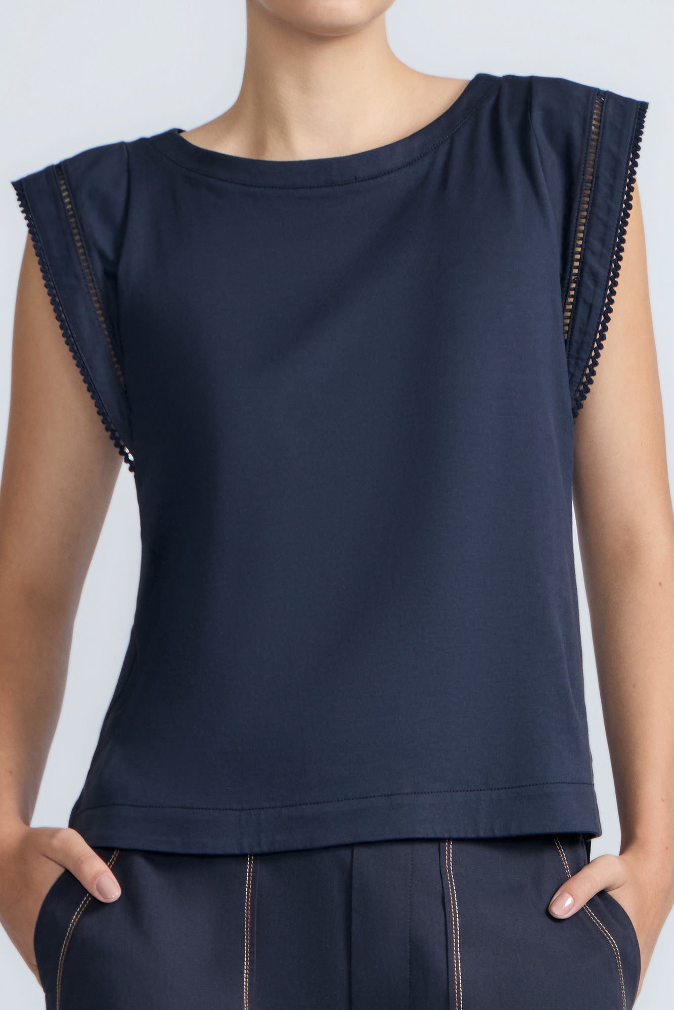 Regina Top in Navy – Soft knit top in 100% Pima cotton with round neck, Greca lace detail, dropped sleeves, and side slits.