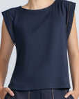 Regina Top in Navy – Soft knit top in 100% Pima cotton with round neck, Greca lace detail, dropped sleeves, and side slits.