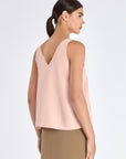 Clean back silhouette of the Ryan Top, showing its relaxed, elegant fit.