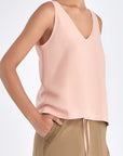 Side profile of the Rose Ryan Top, highlighting the fluid drape of the premium linen blend.