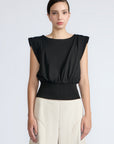Selena Top in Black – Sleeveless cotton top with round neckline, semi-ruffled sleeves, and elasticized waistband.