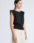 Selena Top in Black – Sleeveless cotton top with round neckline, semi-ruffled sleeves, and elasticized waistband.