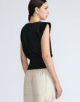 Selena Top in Black – Sleeveless cotton top with round neckline, semi-ruffled sleeves, and elasticized waistband.