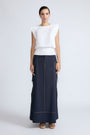 Selena Top in White – Soft cotton sleeveless top with round collar, ruffled arm details, and a gently cinched waist.